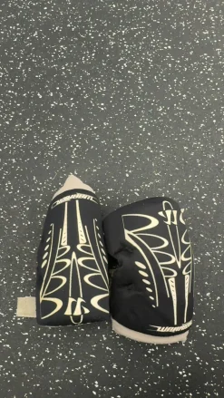 Used Warrior ADRENALINE Lacrosse Arm Pads/Guards Black XS